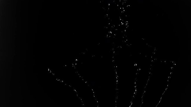 Abstract water falling in slow motion in a black background