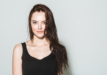 Beautiful brunette womanwith healthy hair and natural makeup