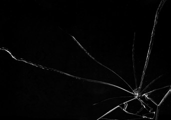 Shards of a broken glass on a black background, shattered pieces. Useful texture in overlay mode....