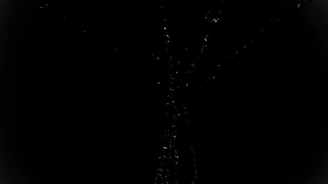 Abstract water falling in slow motion in a black background