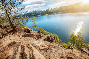 Beautiful forest mountain road near the blue lake