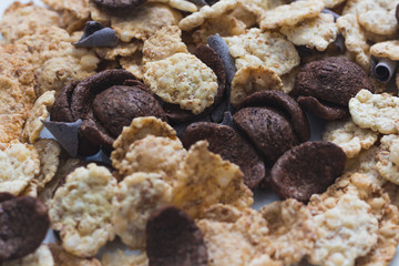 Mix of brown cereals with chocolate close up