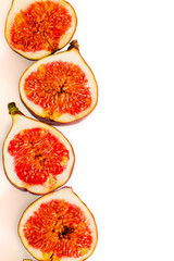 Fresh figs. Fruit with half isolated on white.