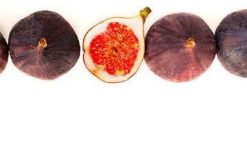 Fresh figs. Fruit with half isolated on white.