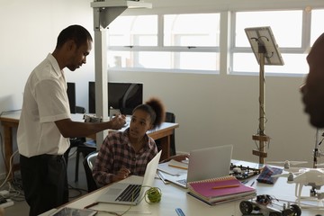Male pilot training to the students