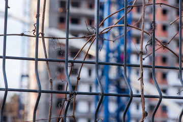 Industrial construction site of new block building in a city. New foundation being filled with...