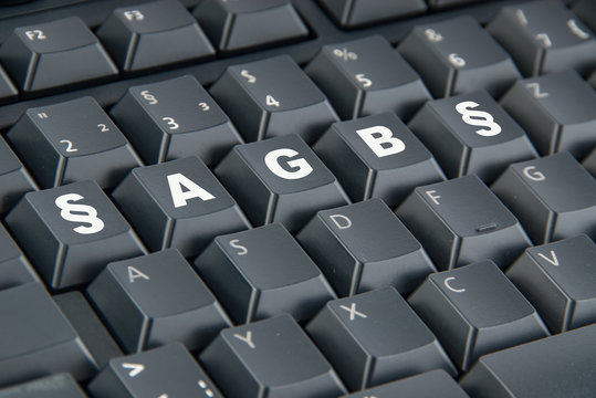 Computertastatur mit Schriftzug AGB