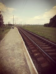 The railroad entering into the distance in summer