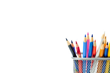 Colored pencils in pencil case isolated on white background.
