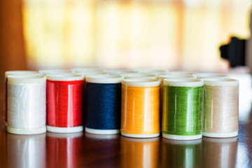 Colorful yarns or threads on spools or bobbins