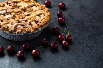 cherry pie on dark background.