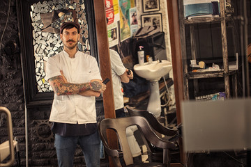 Portrait of hipster barber.