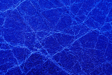 Blue leather background close up