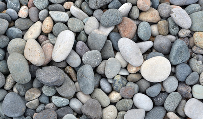 Beach stones background. Top view.