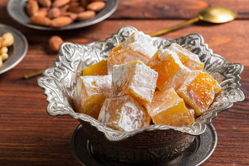 Turkish delight on a wooden table.