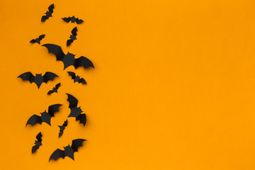 halloween and decoration concept - paper bats flying - obrazy, fototapety, plakaty