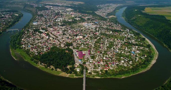 Aerial view of the summer Dnister river bend canyon and famous Ukrainian Zalischyky town. Ternopil region, Ukraine, Europe.