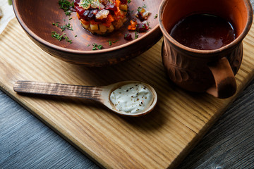 closeup clay dishes with traditional ukrainian food
