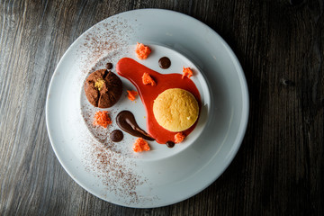 top view of delicious truffle dessert of with sauce decoration