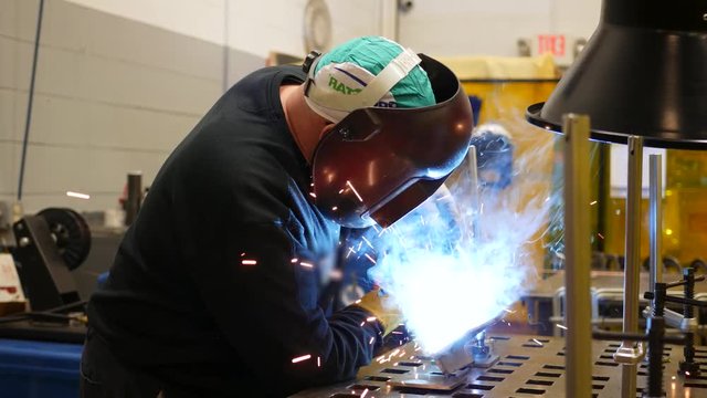 Welding Metal in an Industrial Setting
