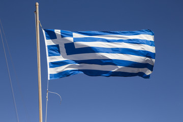 Greek flag isolated on a blue sky