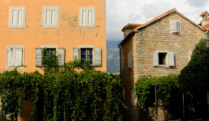 Budva old town. Historic streets, old houses and St. John's Church square. Montenegro, 2018.