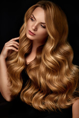 Beauty Hair. Beautiful Woman With Curly Long Blond Hair