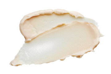 Light beige makeup smear of creamy foundation