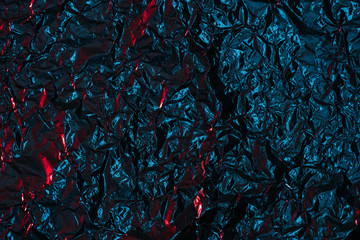 shiny abstract crumpled black foil background