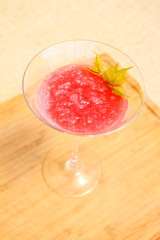 Photo of watermelon cocktails on wooden board.