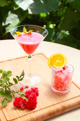 Photo of watermelon cocktails and roses.