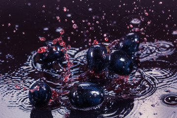Beautiful splashes a clean water and fruit. Clean grape berry