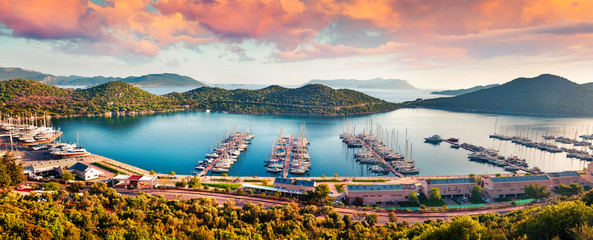 View from the bird's eye of the Kas city, district of Antalya Province of Turkey, Asia. Colorful spring panorama of small Mediterranean yachting and tourist town - obrazy, fototapety, plakaty