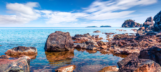Fototapeta premium Picturesque Mediterranean seascape in Turkey. Panorama of a small azure bay near the Tekirova village, District of Kemer, Antalya Province.