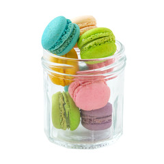 Macaroons in glass bottle isolated on white