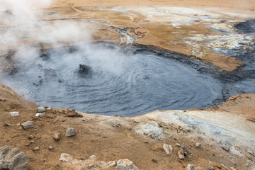 hverir geothermal area in iceland, active mud pod with steam