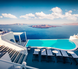Sunny morning view of Santorini island. Picturesque spring scene of the famous Greek resort Thira,...