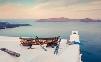 Misty morning view of Santorini island. Picturesque spring scene of the  famous Greek resort Thira,...