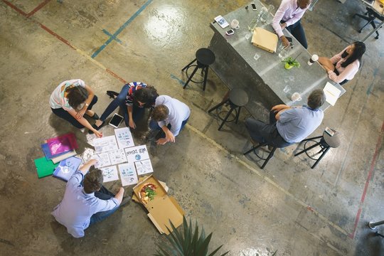 Business people discussing over documents