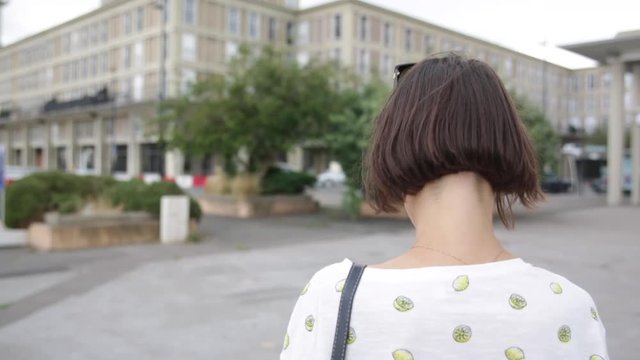 Young woman in a moden city in France