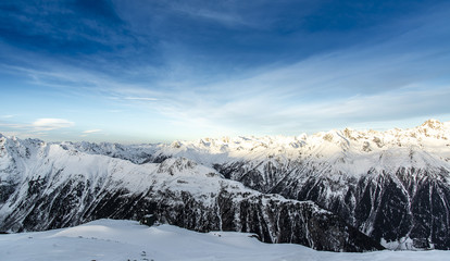 Fototapeta na wymiar Panorama of the Alpine mountains in the morning at the ski resort of Ischgl, Austria.
