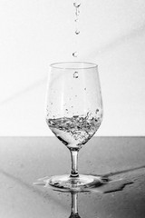 Glass with water, black and white photography