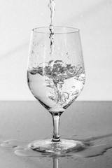 Glass with water, black and white photography