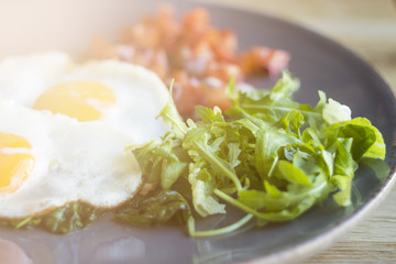 Scrambled eggs with salad.