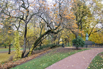 Oslo royal palace garden park, view from parkway alley boulevard avenue with autumn leaves, norway, europe
