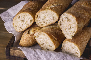 Tasty Crusty Baguettes on Wooden Background Tasty Homemade Bread Horizontal Close Up