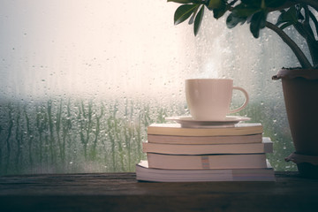 Cup of coffee with book