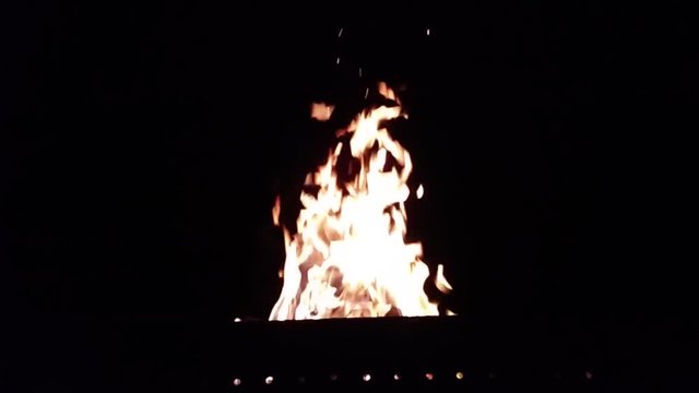 Slow motion video of fire burning in the night 2