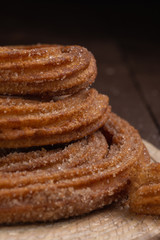 Churros fritos en manteca