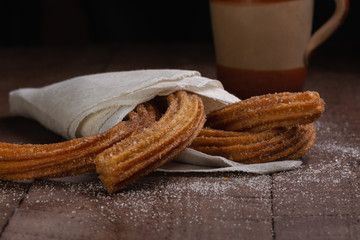 Churros fritos en manteca